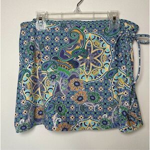 Athleta women’s multi-color floral mini wrap skirt size Medium. #40-1403